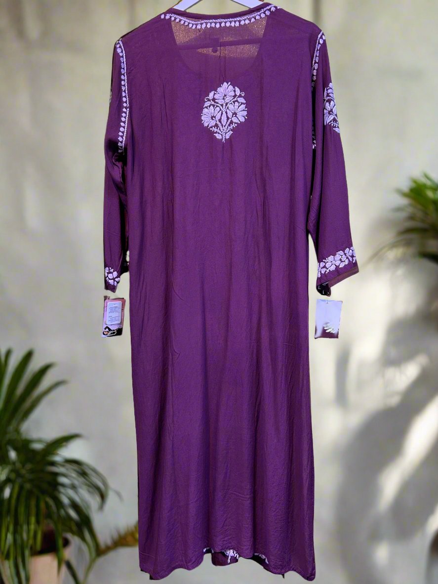 A floral embroidered purple kurta set with palazzo trousers.