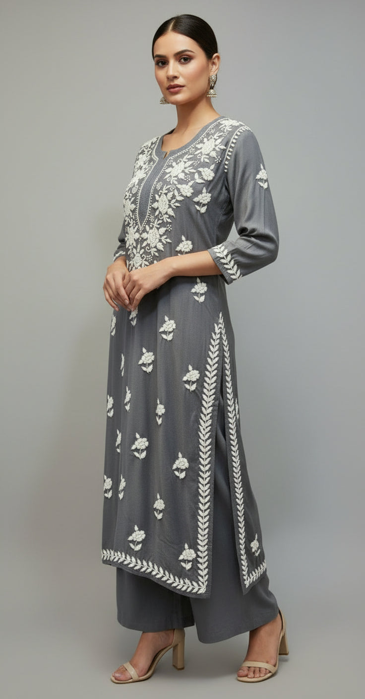 A fully embroidered grey colour modal fabric kurti with floral Ghass Patti hand embroidery and a full border on display.