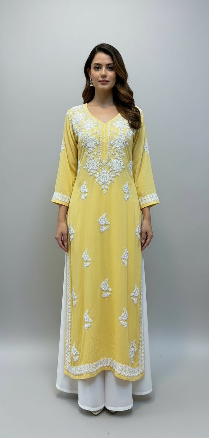 A fully embroidered yellow colour modal fabric kurti with floral Ghass Patti hand embroidery and a full border on display.