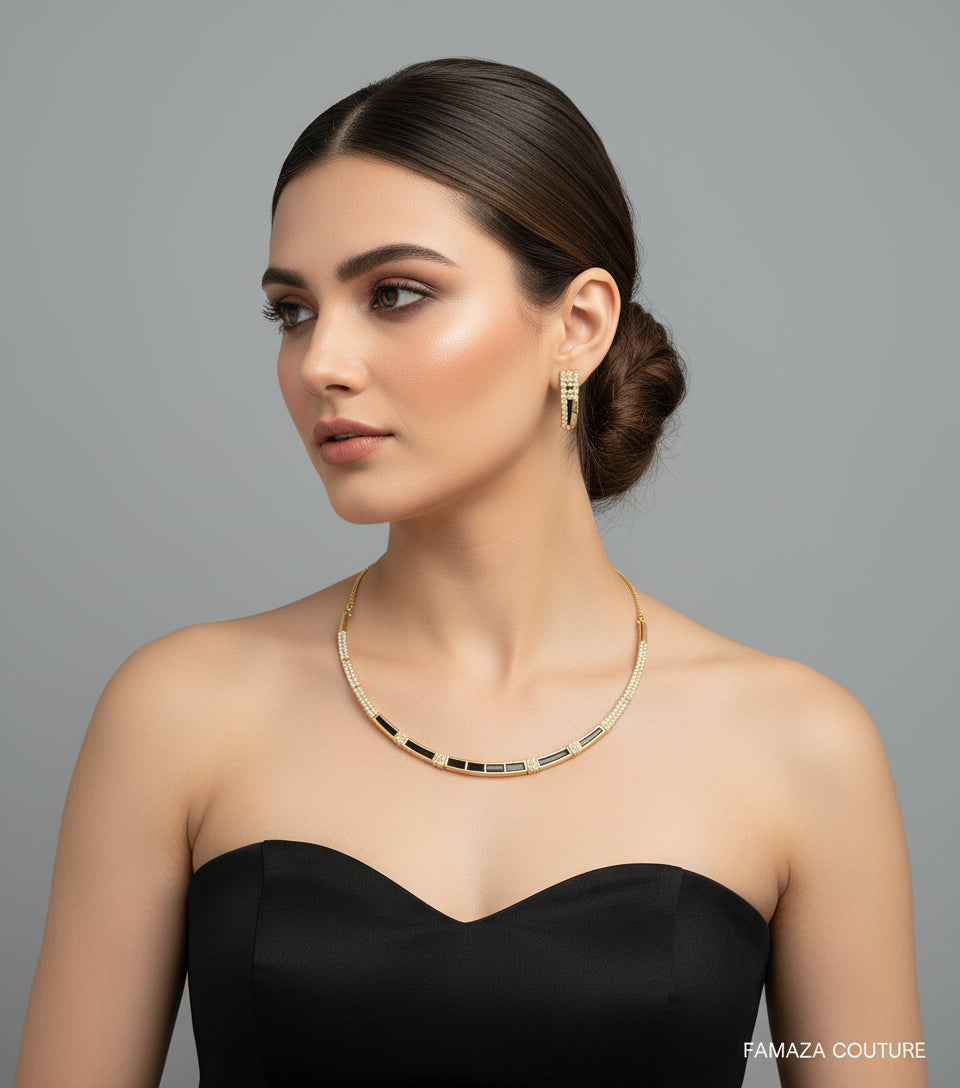 A gold-tone Hasli necklace set with American diamonds and semi precious stones by famaza couture 