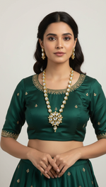 A gold-toned Kundan mala necklace with polki kundan embellishments and matching earrings by famaza couture 
