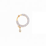 A gold hoop earring embellished with clear pavé stones and featuring a dangling teardrop-shaped clear stone, shown on a plain white background.