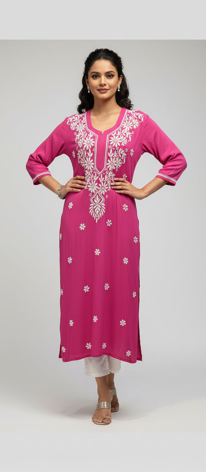 A hot pink colour modal fabric 46 inches long kurti with white hand embroidery in a Ghass Patti pattern and booti work. 
