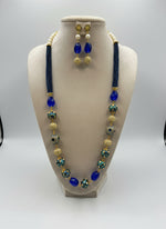 A luxury Tanjore Art Meenakari beaded Mala Set, featuring a regal bridal necklace and matching earrings with blue and gold details. Paty wear set. 