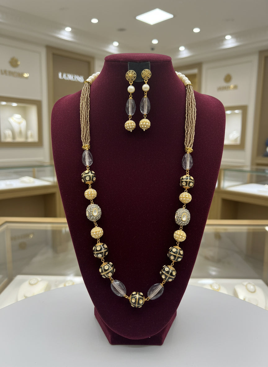 A luxury Tanjore Art Meenakari beige beaded Mala Set, featuring a regal bridal necklace and matching earrings with grey and gold details. Party wear set. 