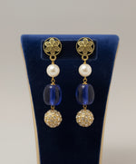 A luxury Tanjore earrings with blue and gold details. Paty wear earrings. 