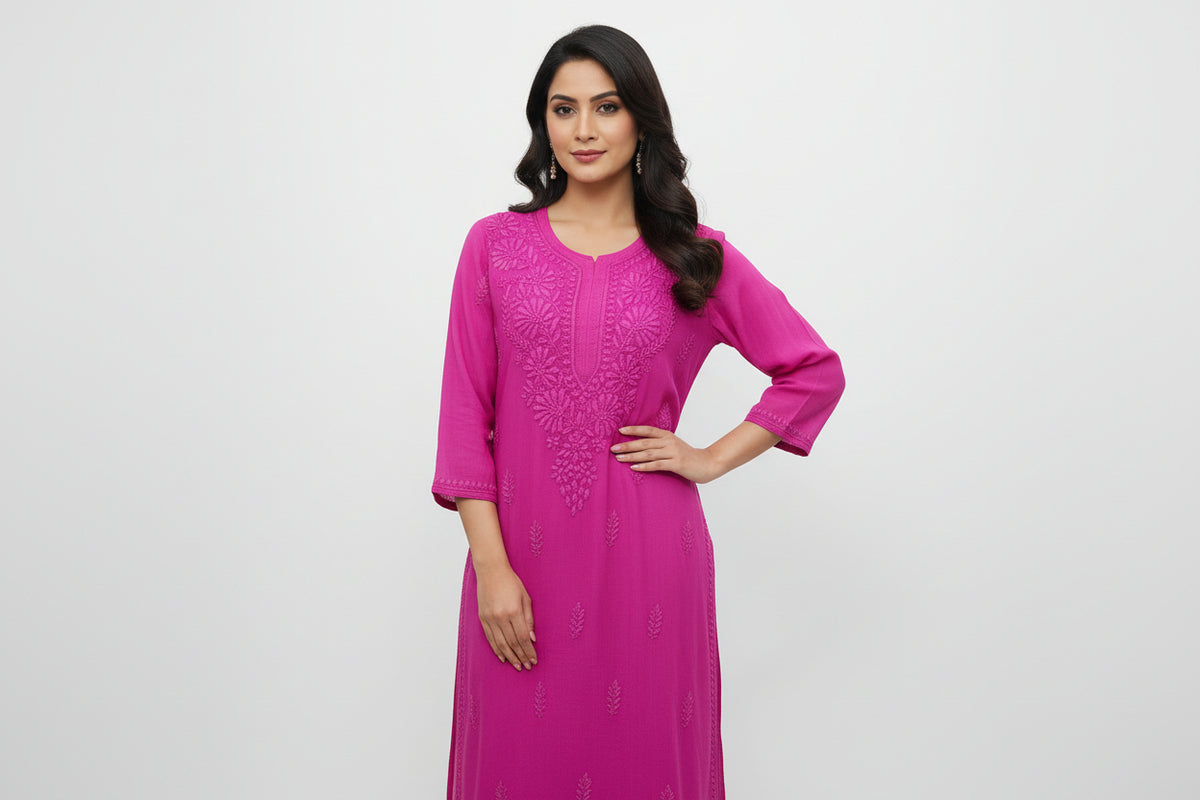 A magenta colour viscose fabric tone to tone silk thread hand embroidered long kurti.