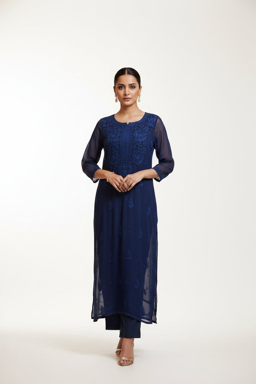 A navy blue sheer embroidered long kurti dress with three-quarter sleeves, hanging on a white hanger against a dark background.