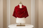 A red colour velvet fabric shawl with gold colour nano beads embellishments and intricate bird figure and rose flower patterns.