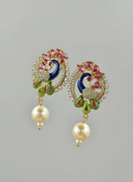 A rhodium-gold plated peacock design accompanied earrings, featuring vibrant green, blue, enamel accents, as well as sparkling crystal white and ruby pink stones. Earrings design is focused. 