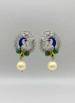 A rhodium-silver plated peacock design accompanied earrings, featuring vibrant green, blue and yellow enamel accents, as well as sparkling white andwhite AD crystal stones. Earrings design is focused. 