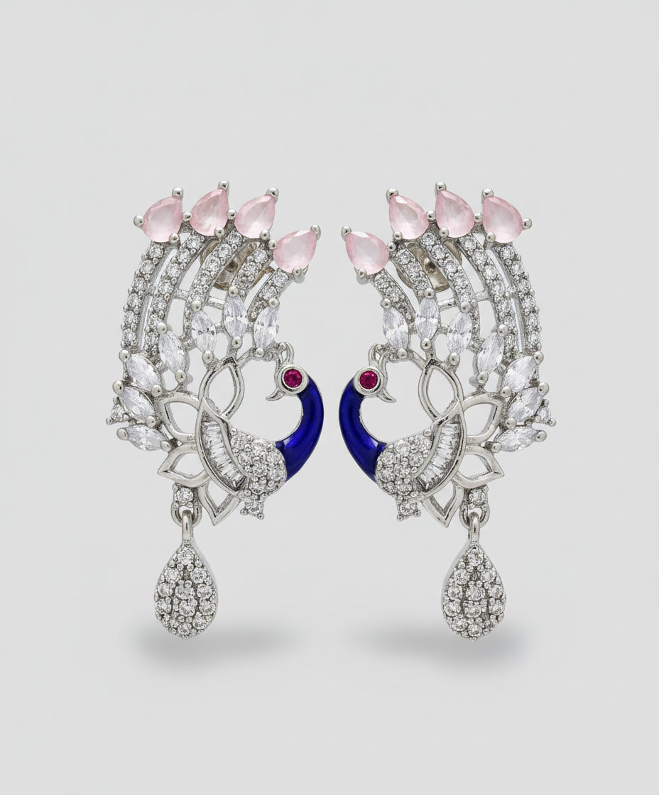 A set of peacock-shaped earrings. The earrings are detailed with blueenamel and has sparkling white and pink ad crystal embellishments.