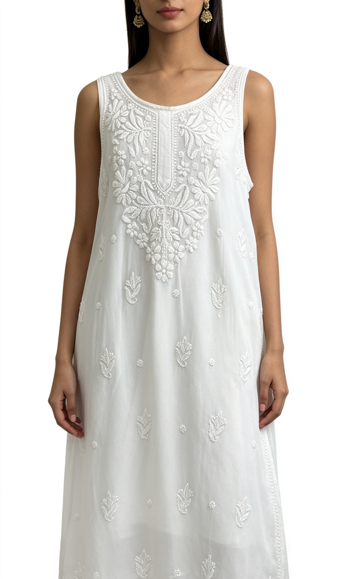 A sleeveless white tunic dress with intricate floral embroidery and beadwork on the chest and scattered motifs on the skirt, shown on a model against a plain white background.