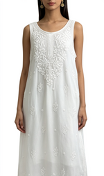A sleeveless white tunic dress with intricate floral embroidery and beadwork on the chest and scattered motifs on the skirt, shown on a model against a plain white background.