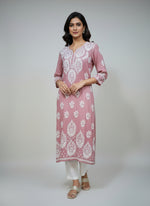 A tea pink colour modal fabric 46 inches long kurti with white thread hand embriodery all over the kurti, sleeves and daaman.