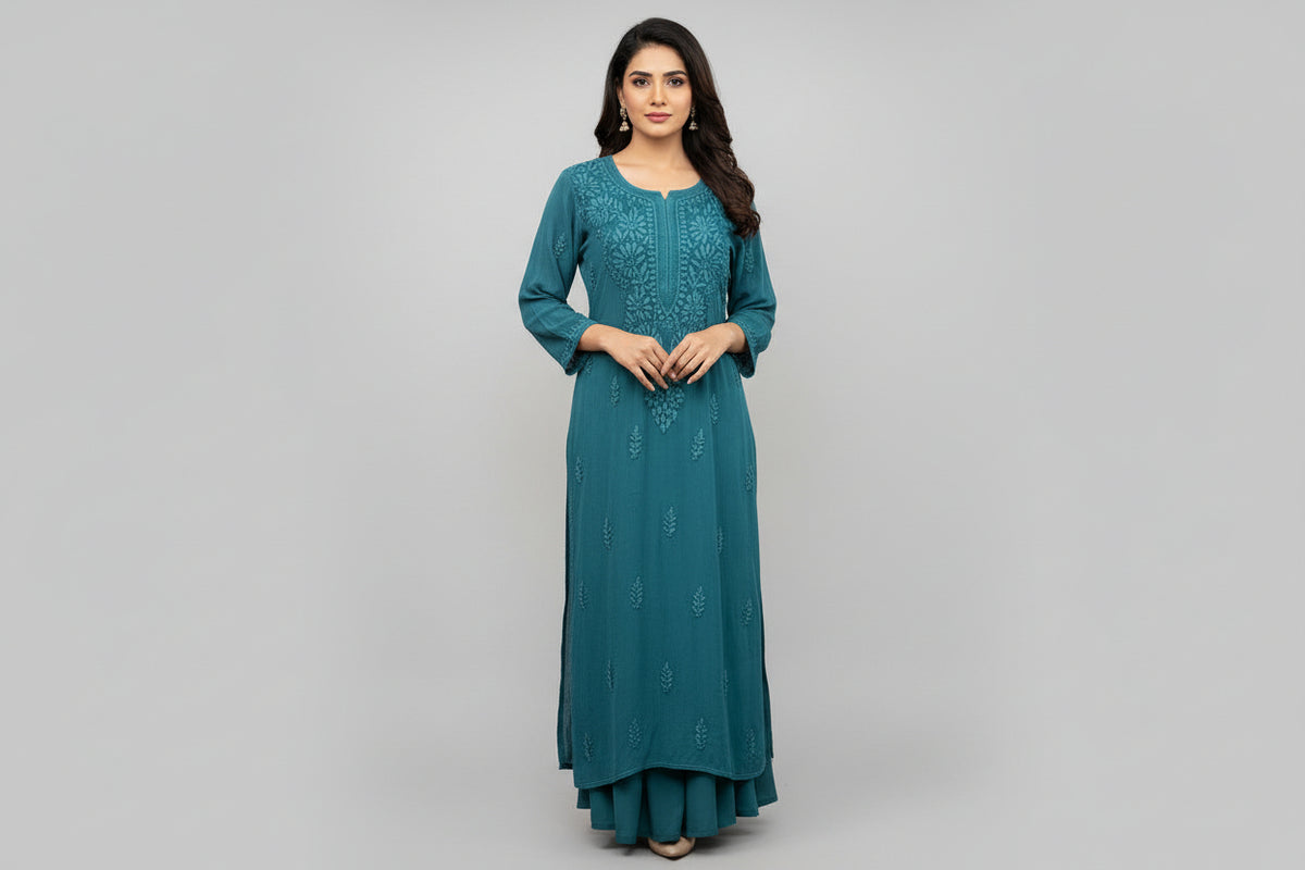 A teal colour viscose fabric tone to tone silk thread hand embroidered long kurti.