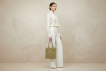 Handcrafted gold beaded tote bag for weddings and evening events.