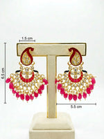 A visual guide of the Kundan and enamel earrings on a stand, showing the 6.5cm length and 5.5cm width.
