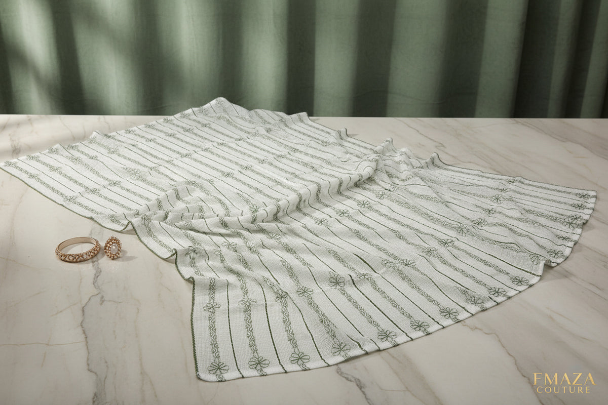 A white base colour handcrafted Kota Doriya Chikankari duppata with green thread Hand-embroidered duppata by Famaza Couture. 