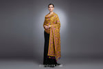A yellow colour pashmina scarf with Kashmiri embroidery in a floral pattern, featuring tassels on the ends.