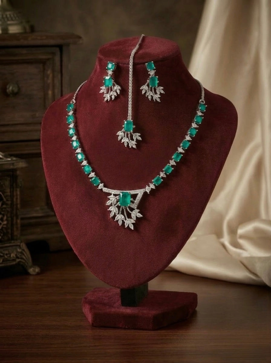 American diamond jewellery set including necklace, earrings and maang tikka with turquoise centre stone. 