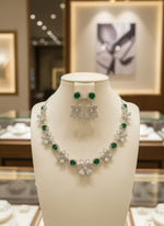 Nano American diamonds and emerald green central stone necklace and earrings jewellery by famaza couture