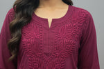 Close-up view highlighting the detailed neckline and intricate leaf embroidery on a deep plum short kurti, presented as a standalone short kurti without bottom trousers.