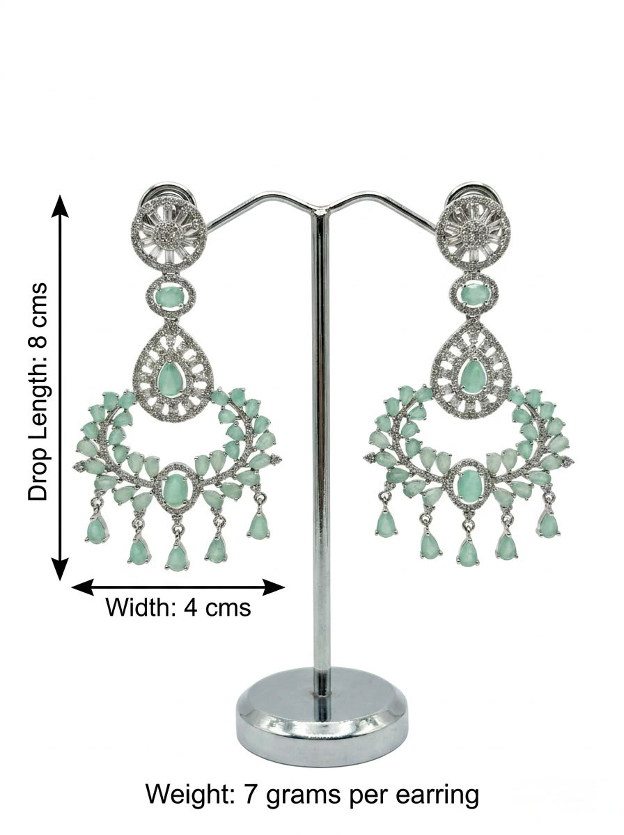 Studio shot of Aqua Mist drop statement earrings on a display stand, highlighting dimensions of 8 cm length, 4 cm width, and 7 grams weight per earring.