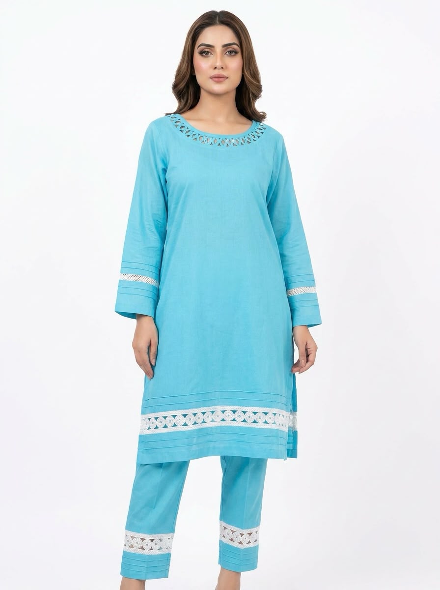 A model wearing a knee-length aqua blue plain cotton kurta with white cut-work lace detailing on the neckline, sleeves, and hem, paired with matching straight-leg trousers.