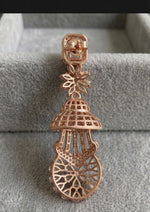 "Back view of Aria Imperial rose gold Jhumka earring showing intricate filigree pattern and secure stud backing."
