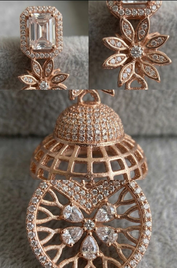 Detailed texture shot of rose gold jewelry featuring precision-set sparkling stones, showcasing the couture-level craftsmanship and fine metalwork.