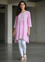 Baby pink colour short length Chikankari kurti with white floral hand embroidery by famaza couture 