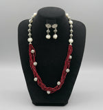 Beaded mala with silver and pearl beads in on both sides start and drop is designed with maroon colour nano glass bead with silver ball beads, along withLotus design earrings with silver and pearl beads in drop. Oxidised jewellery set. 