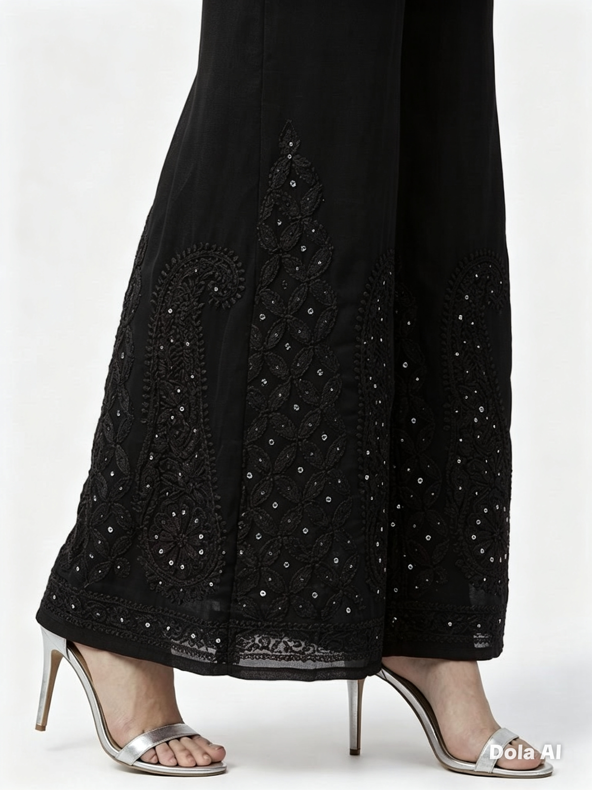 Black embroidered sharara with silver kaamdani on a white background