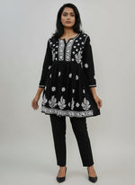Black short frock with chikankari embroidery by famaza couture 