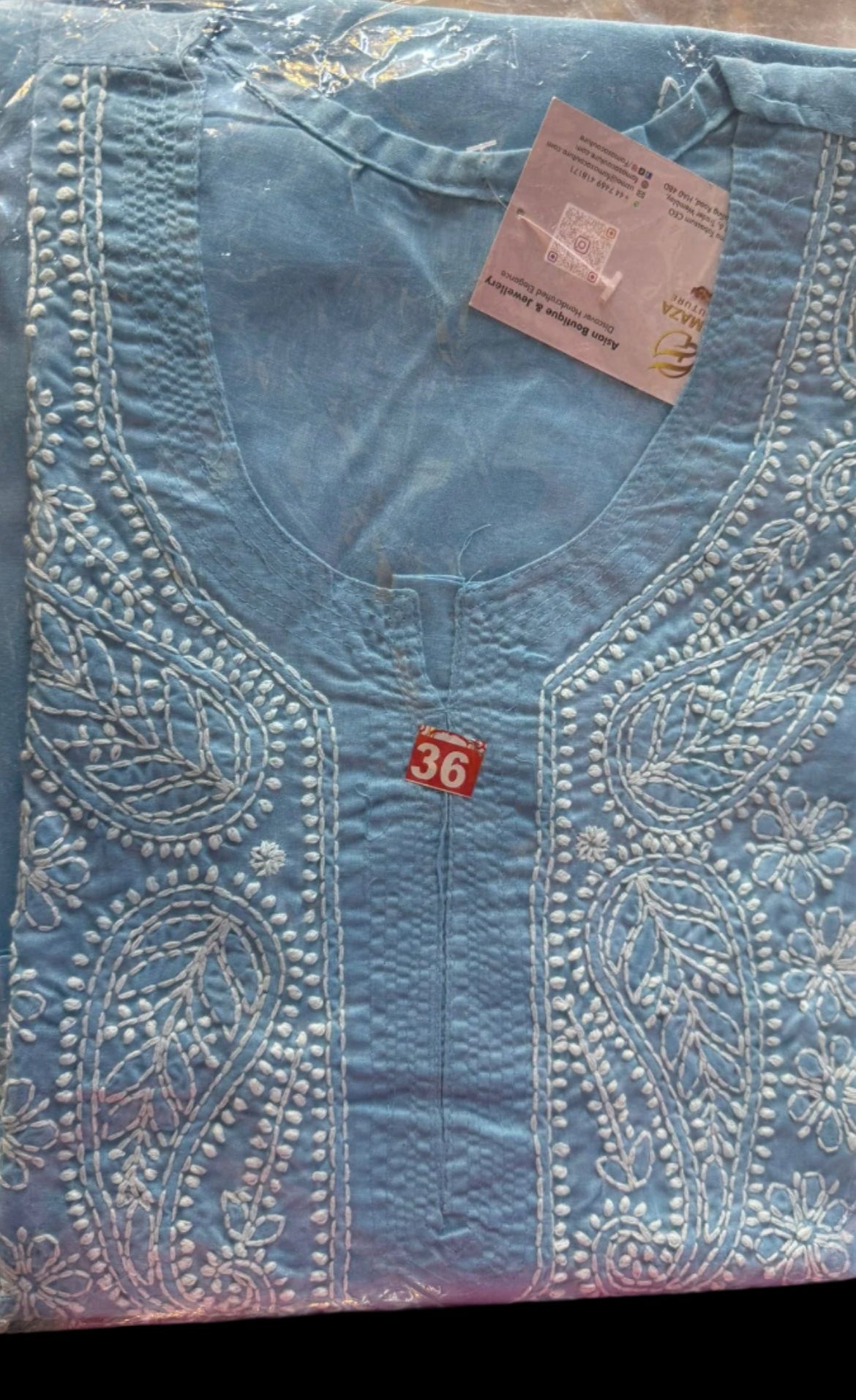Blue chikankari kurti neck close up 