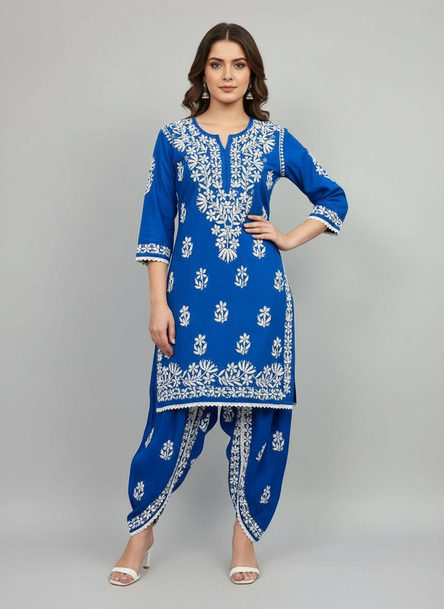 Blue colour cotton fabric kurti and dhoti trousers back side design is showing in this image.
