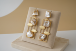 Brass metal dangler earrings with Baroque Pearls.