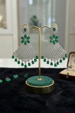 Grand emerald green and American Diamond geometric mesh statement earrings.