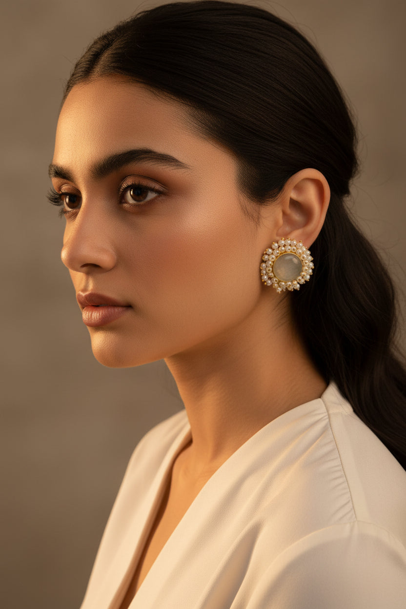 Classic white Mona Lisa stone and nano pearl studs on model, premium 18k gold plated English jewellery for a clean bridal look.