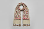 Close-up of a Kashmiri embroidered pashmina scarf featuring floral patterns with detailed embroidery and tassels.