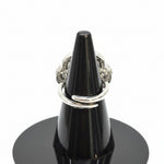Close-up of premium rhodium-plated adjustable band mechanism for a custom, flexible fit.