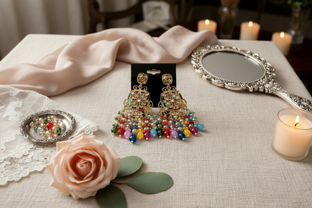 Close-up of rose gold AD stone earrings on a jewellery stand, showcasing multi-colored crystal beads and intricate English jewellery design.