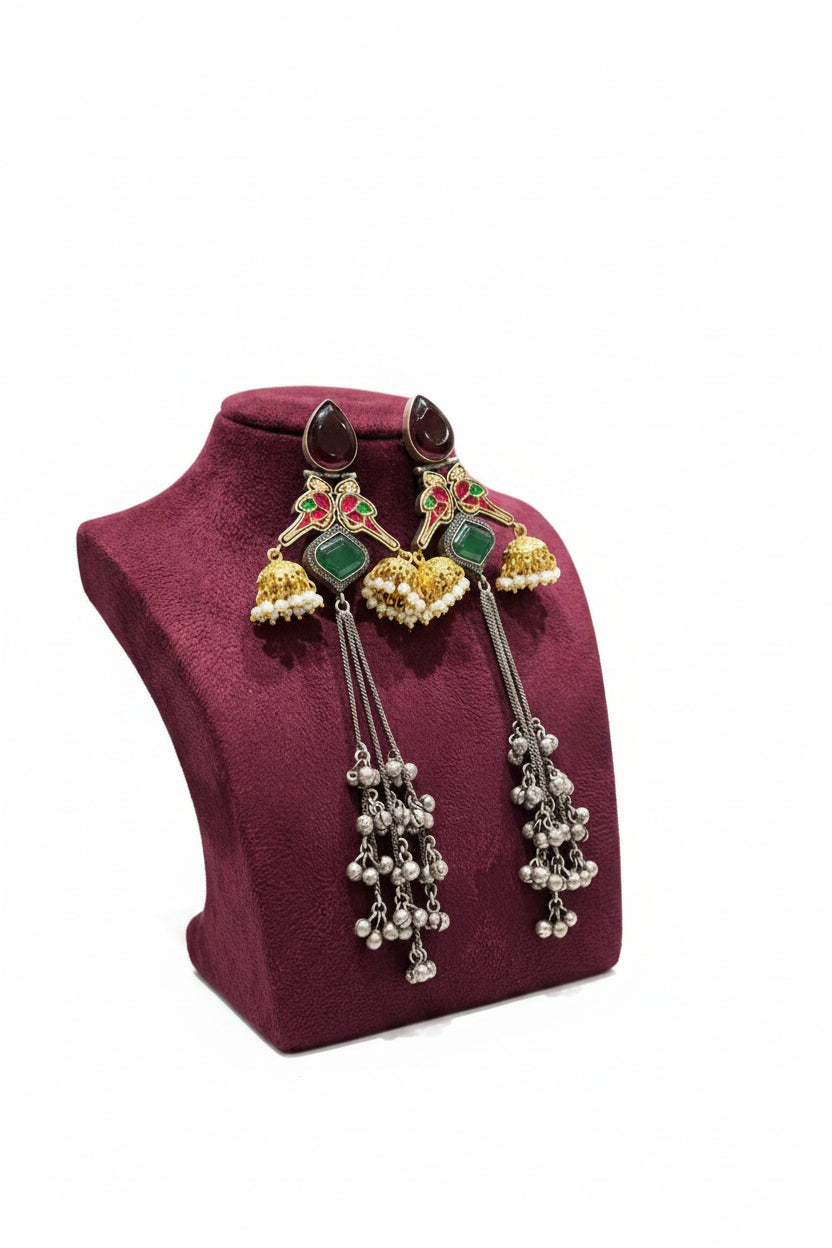Close-up of the circular Kundan stud showing the intricate floral stone setting and the delicate seed pearl halo.