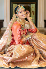 Close up of Kimkhab Brocade fabric and Zari work on Bridal Dress