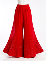 Front view of a premium crimson georgette sharara featuring intricate Akhandani embroidery and Mukaish work on a white background.
