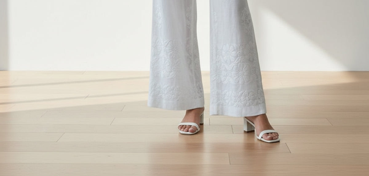 Curvy woman wearing white embroidered modal trousers with kurta