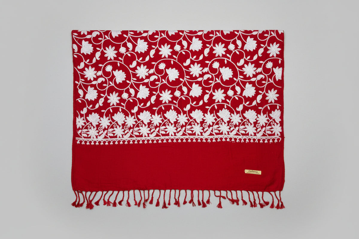 Decorative red scarf with white floral pattern 