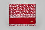 Decorative red scarf with white floral pattern 
