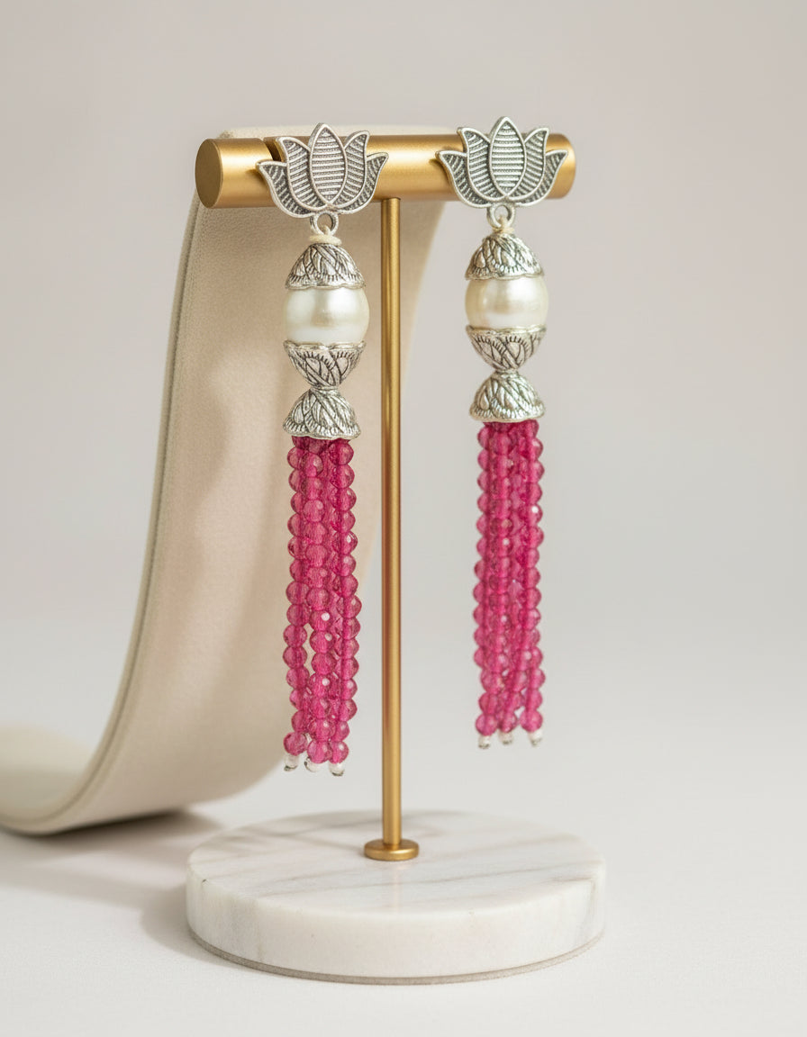 Earrings with Lotus flower stud than white pearl and than hot colour glass beads multi layers in hanging design. 